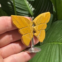 Mookait sommerfugl st�ende p� fod