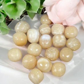 Orange calcit lommesten