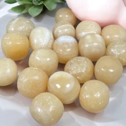 Orange calcit lommesten