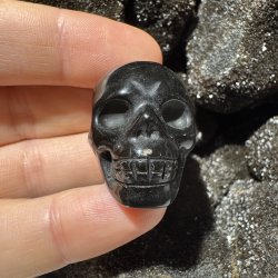 Guld obsidian skull