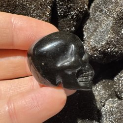 Guld obsidian skull