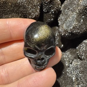 Guld obsidian skull
