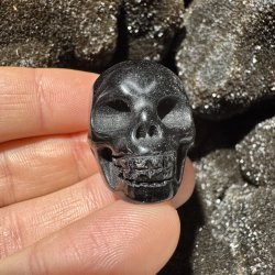 Guld obsidian skull