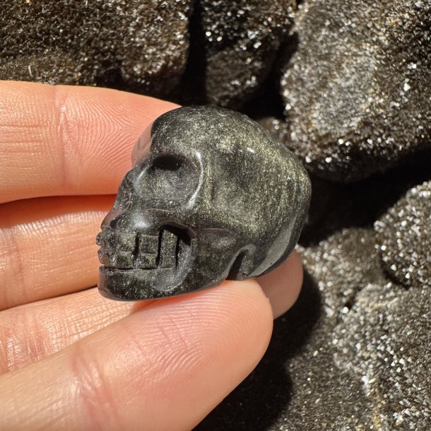 Guld obsidian skull