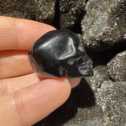 Guld obsidian skull