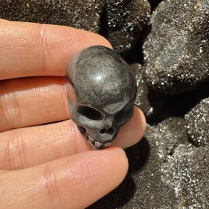 Guld obsidian skull