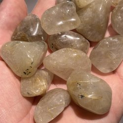 Guldrutil kvarts lommesten