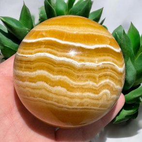 Orange stribet calcit kugle 74mm