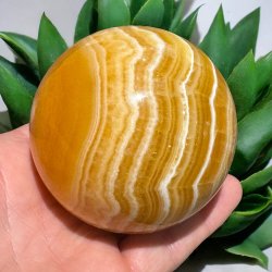 Orange stribet calcit kugle 74mm