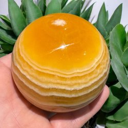 Orange stribet calcit kugle 74mm