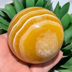 Orange stribet calcit kugle 74mm