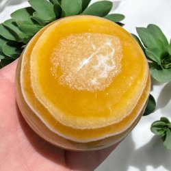 Orange stribet calcit kugle 74mm