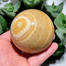 Orange stribet calcit kugle 71mm