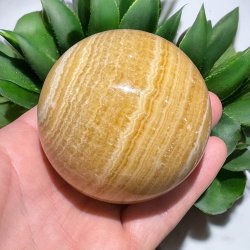 Orange stribet calcit kugle 71mm