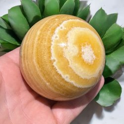 Orange stribet calcit kugle 71mm