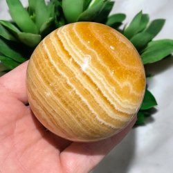 Orange stribet calcit kugle 70mm