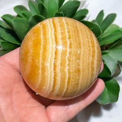 Orange stribet calcit kugle 70mm