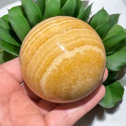 Orange stribet calcit kugle 70mm