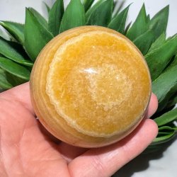 Orange stribet calcit kugle 70mm