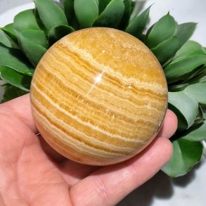 Orange stribet calcit kugle 70mm
