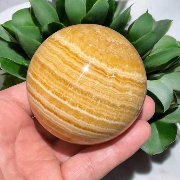 Orange stribet calcit kugle 70mm