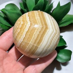 Orange stribet calcit kugle 69mm