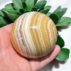 Orange stribet calcit kugle 69mm