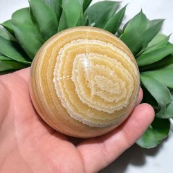 Orange stribet calcit kugle 69mm