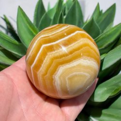 Orange stribet calcit kugle 69mm