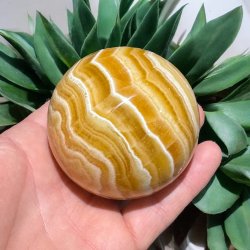 Orange stribet calcit kugle 69mm