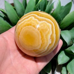 Orange stribet calcit kugle 69mm