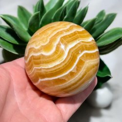 Orange stribet calcit kugle 69mm