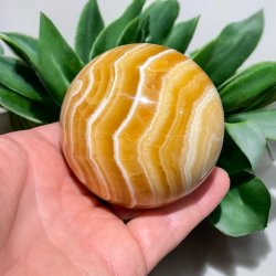 Orange stribet calcit kugle 69mm