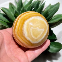 Orange stribet calcit kugle 69mm