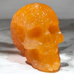 Orange calcit skull