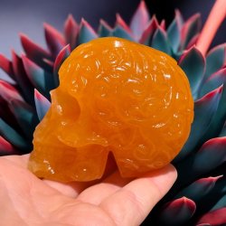 Orange calcit skull