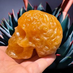Orange calcit skull