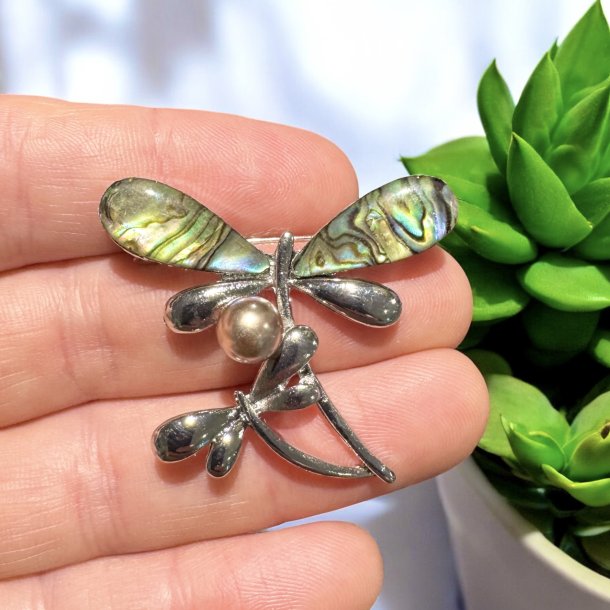 Guldsmed broche med pauaskal