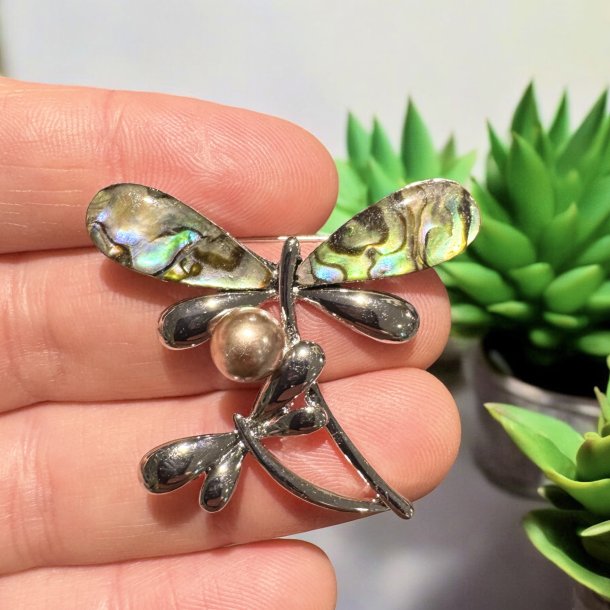 Guldsmed broche med pauaskal