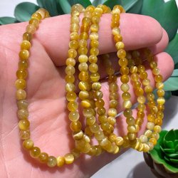 Gylden tiger�je armb�nd 4mm