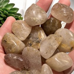 Guldrutil kvarts lommesten